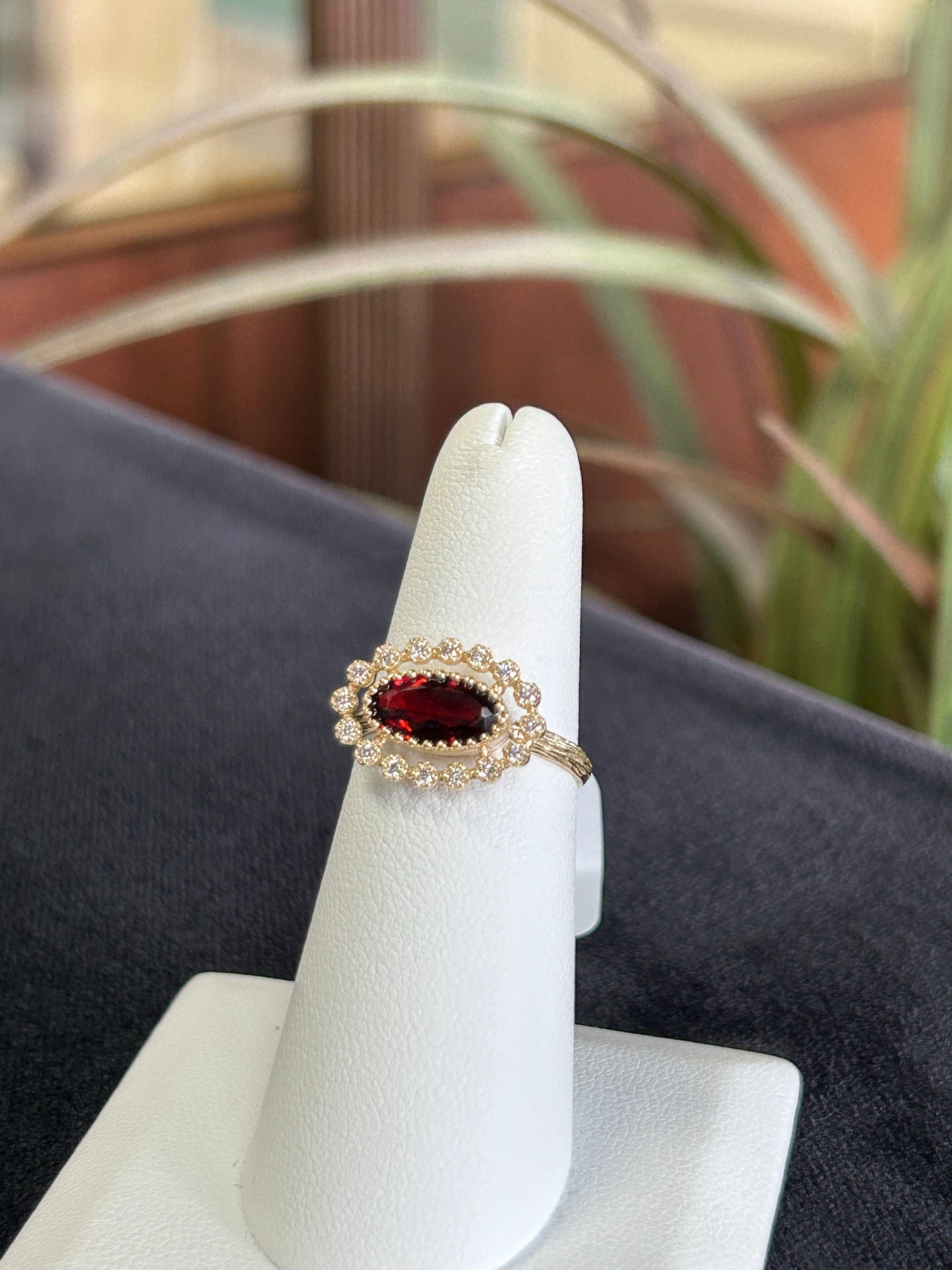 Unique Garnet Gemstone Ring with Diamond Halo in Yellow Gold