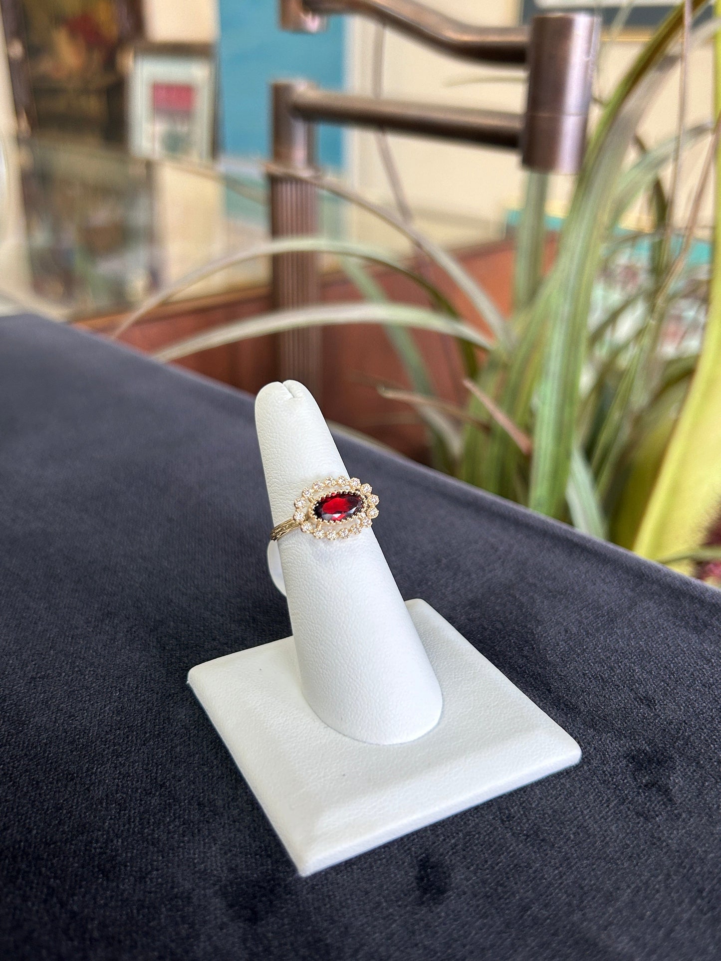 Unique Garnet Gemstone Ring with Diamond Halo in Yellow Gold