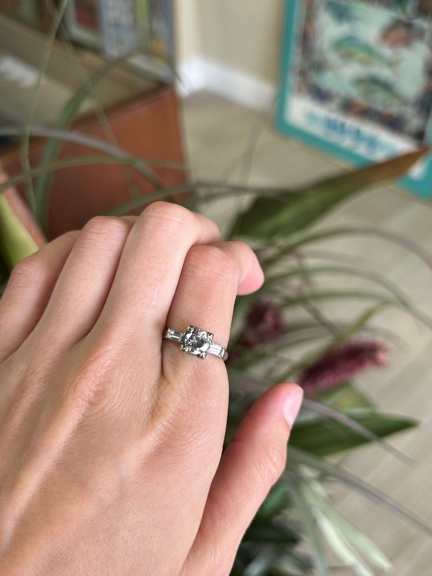 Round Brilliant Cut Center stone with Baguette Side Stones Engagement Ring