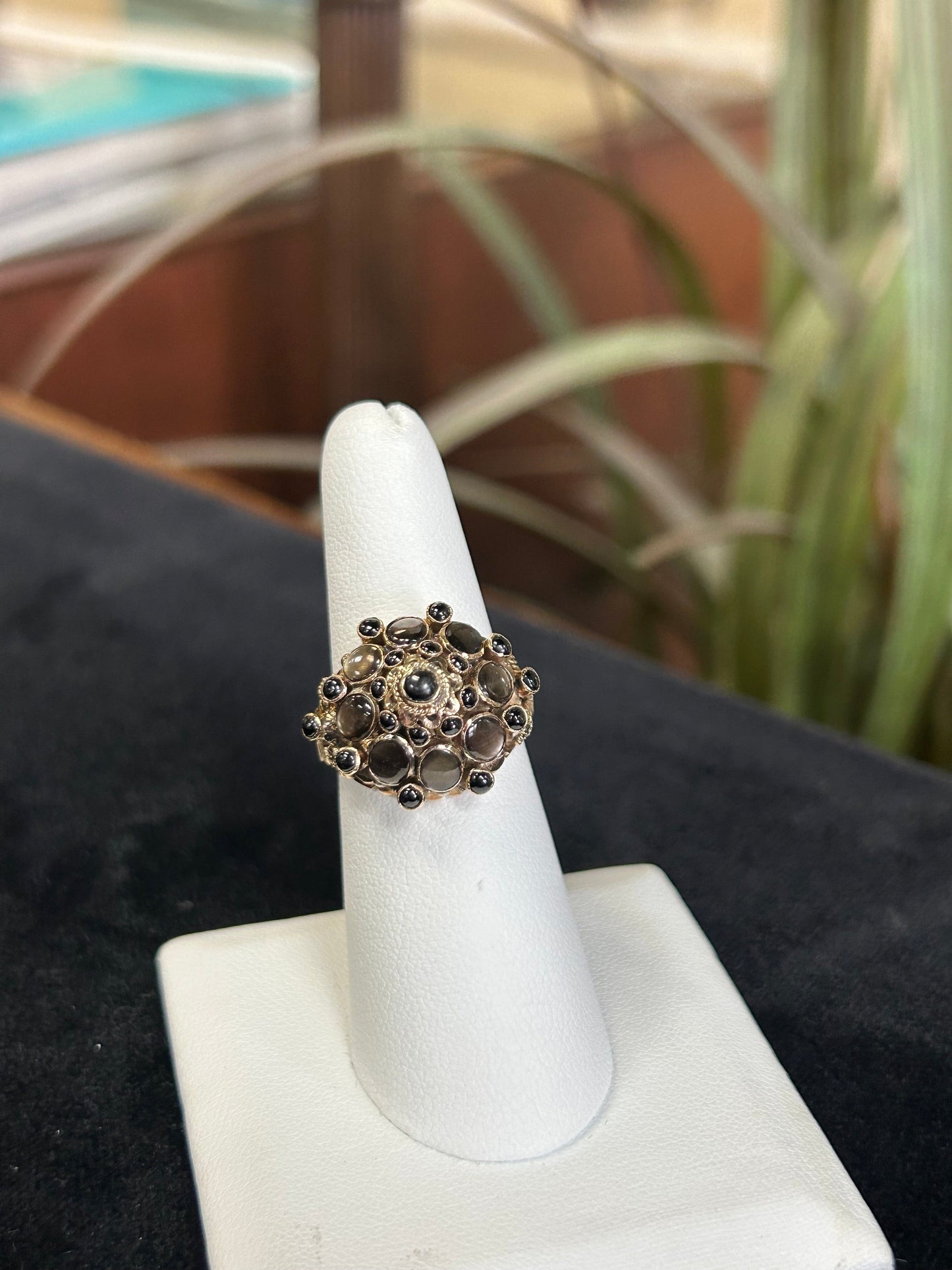 a close up of a ring on a ring holder