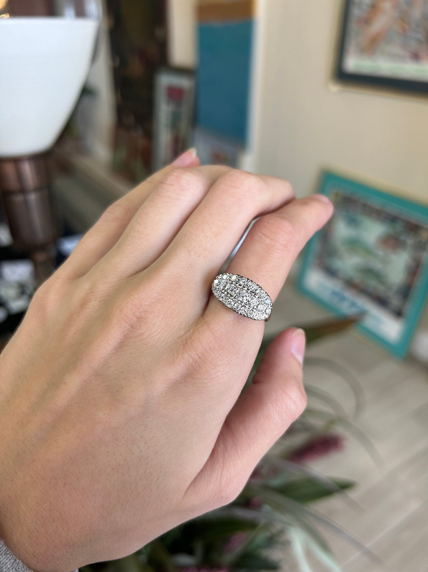 a woman's hand with a ring on it