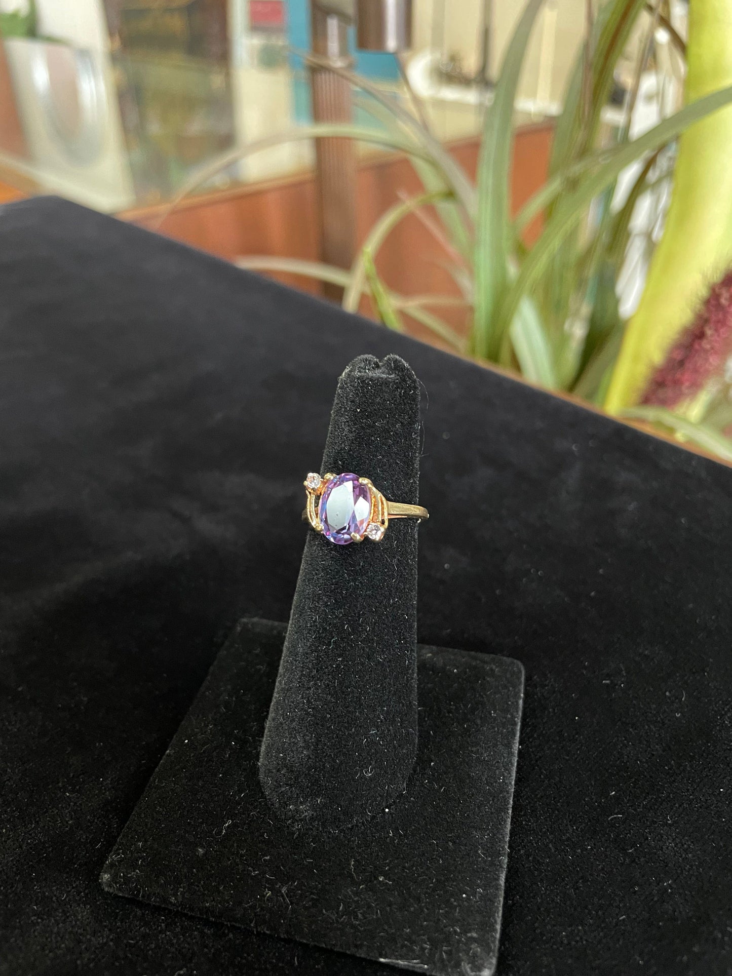 Purple gemstone yellow gold ring
