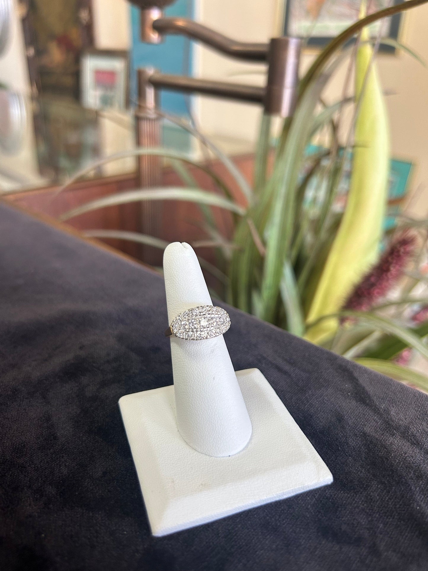 a close up of a ring on a ring holder