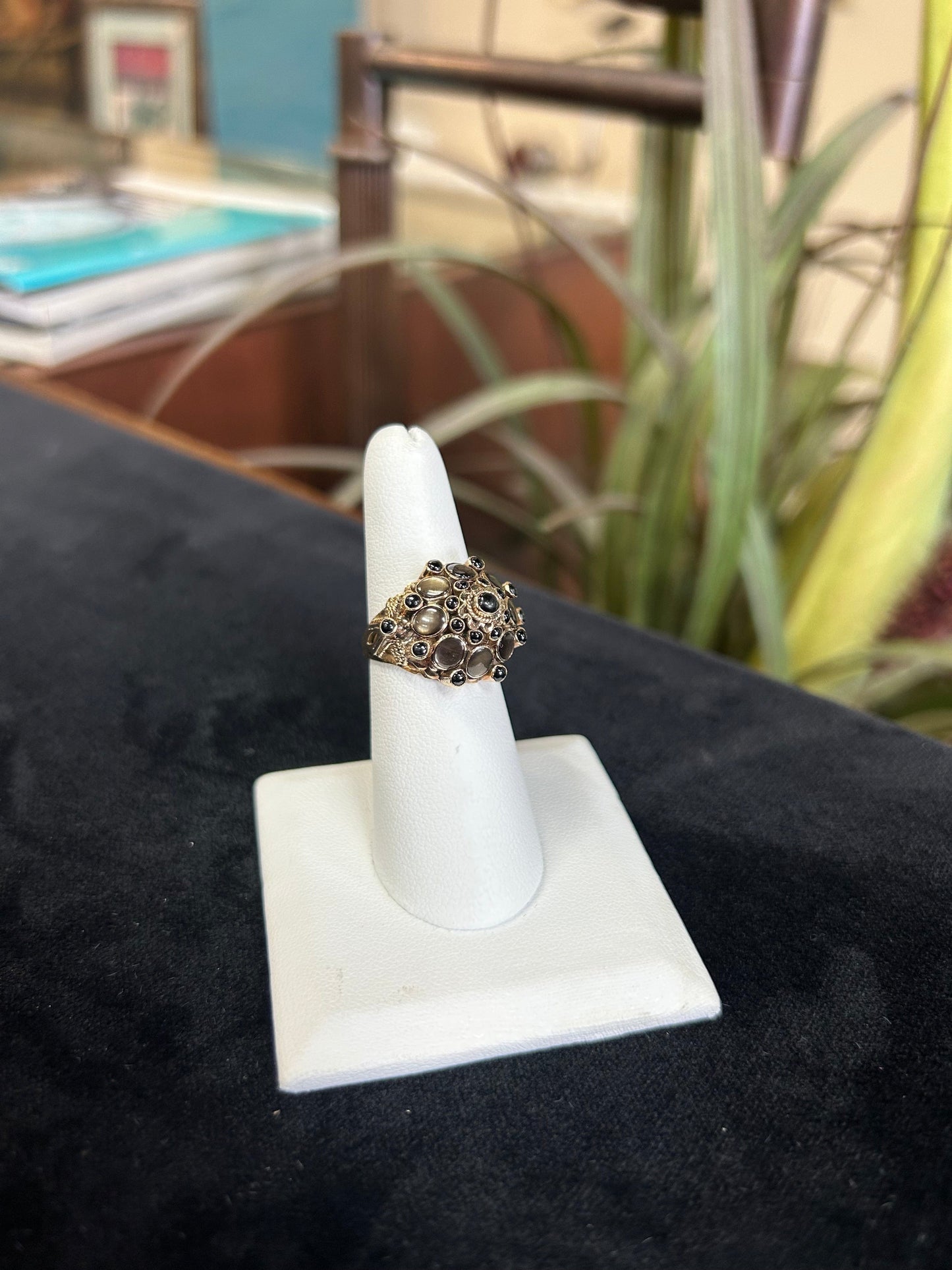 a close up of a ring on a ring holder