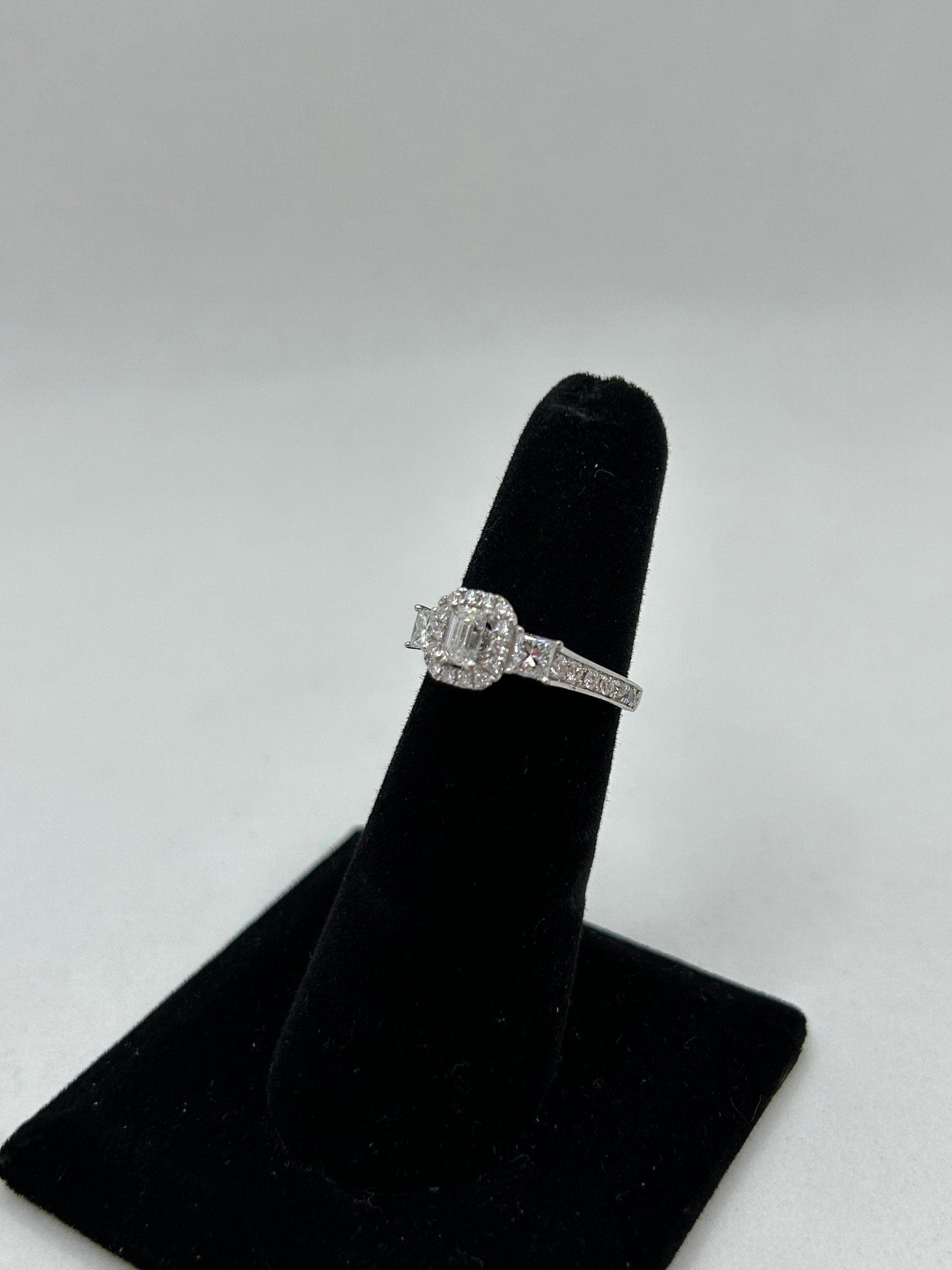 Past Present and Future Three Stone Diamond Engagement Ring Princess and Emerald Cut Halo Setting