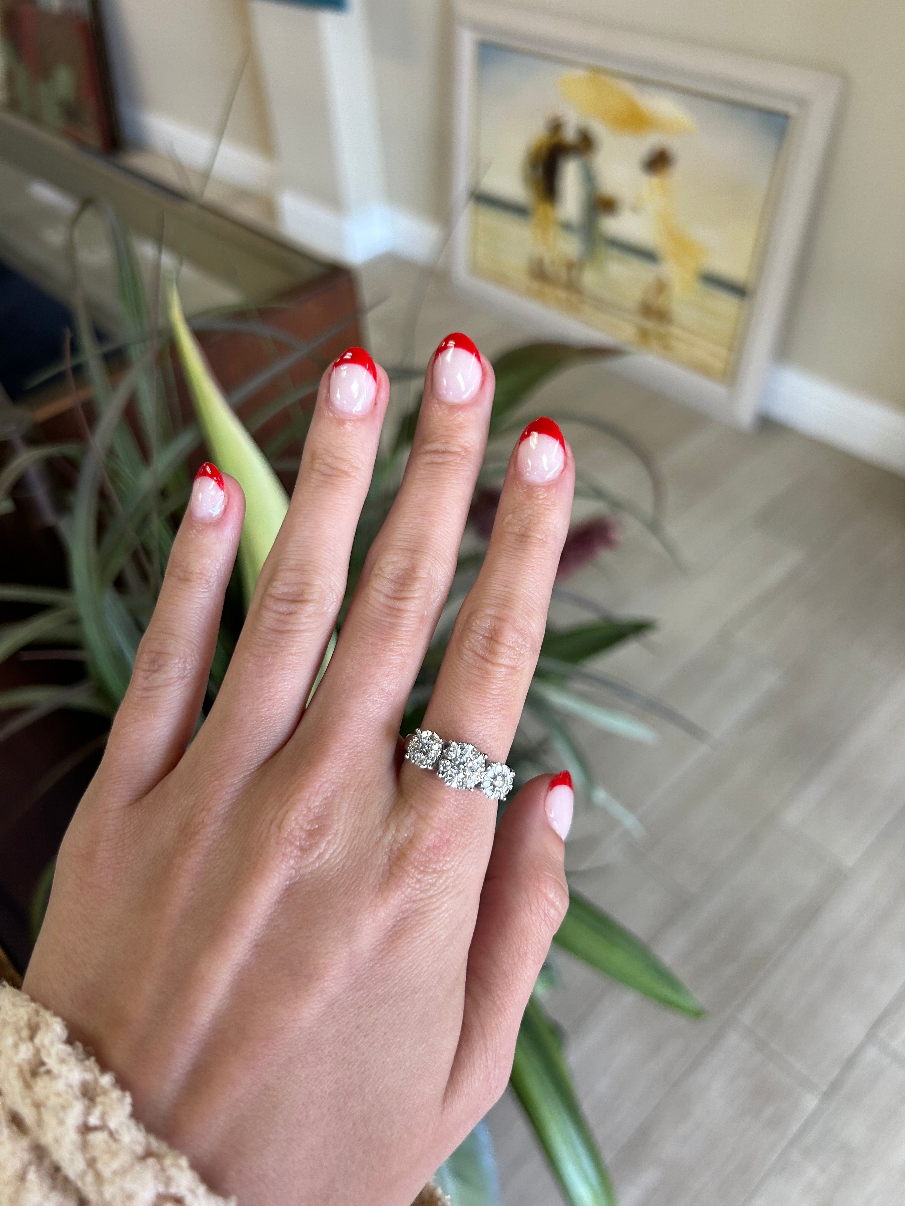 White Gold Three Stone Diamond Ring with Diamond Halo