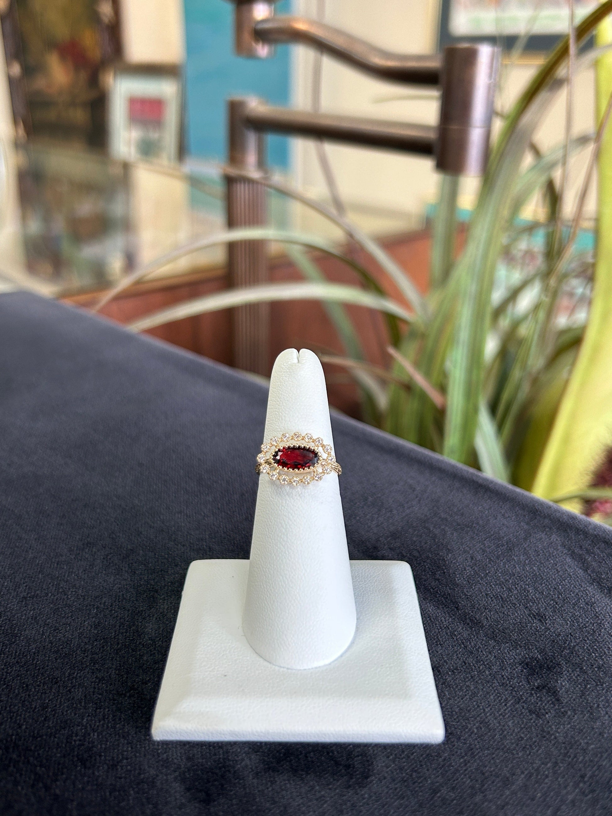 Unique Garnet Gemstone Ring with Diamond Halo in Yellow Gold