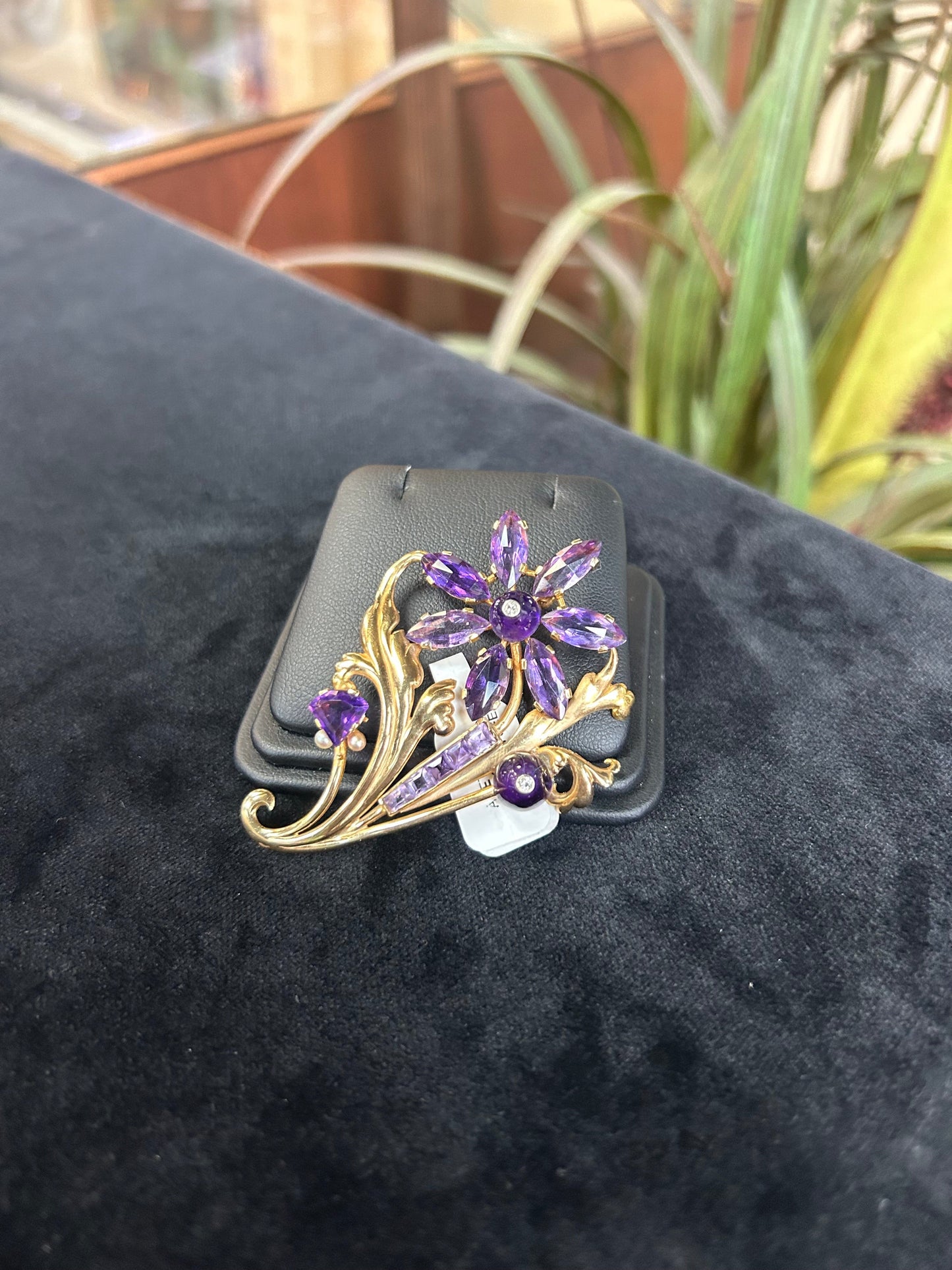 a close up of a cell phone with a flower on it