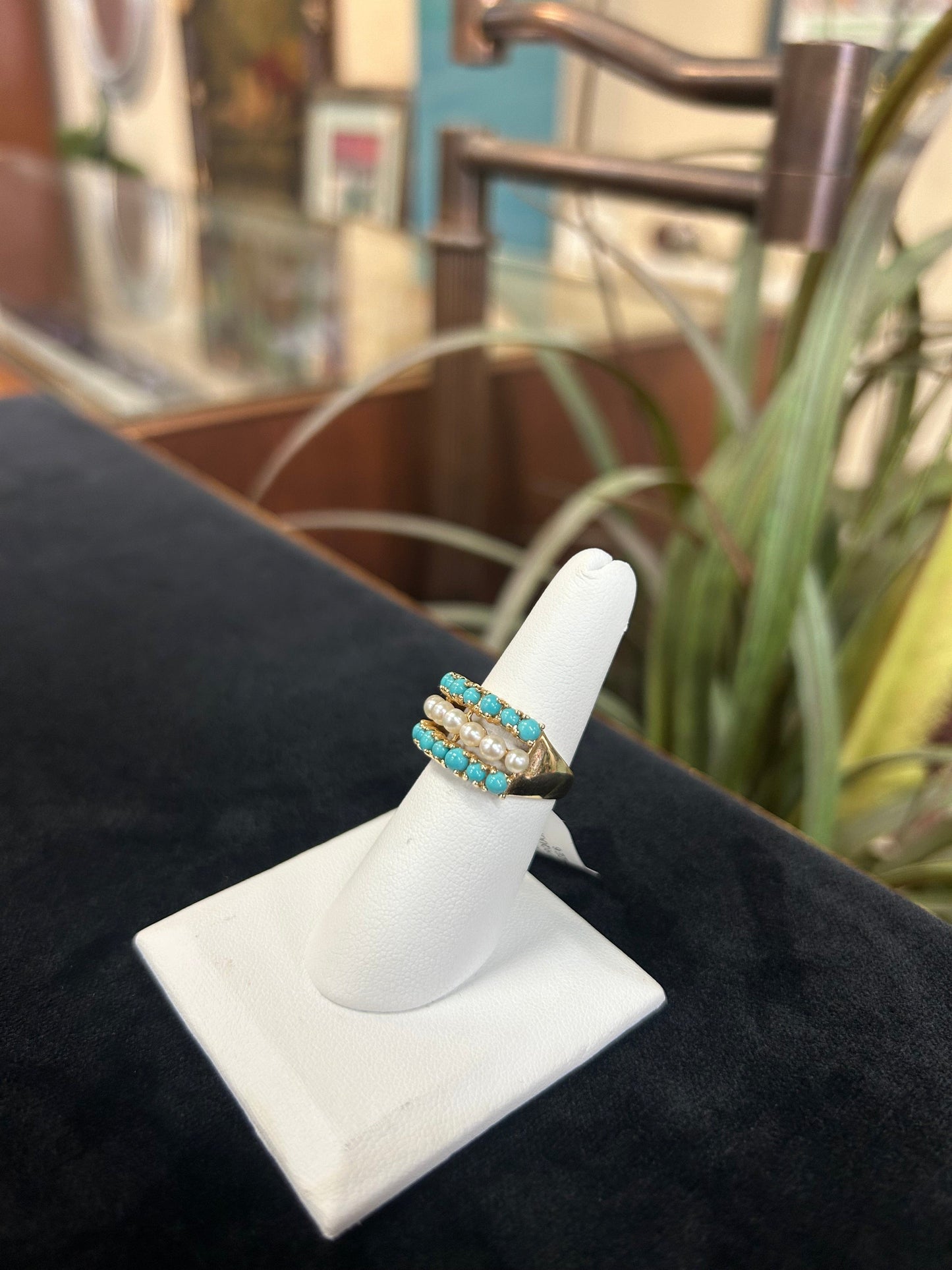 a white napkin with a napkin ring on top of it