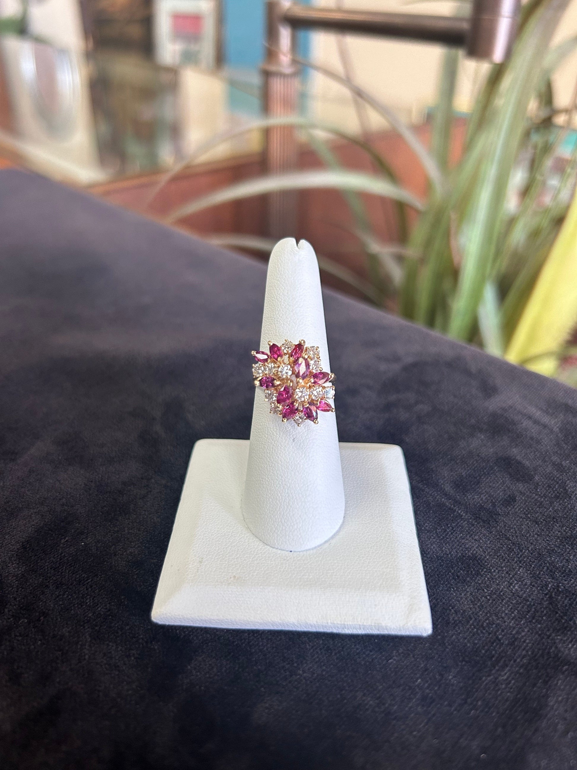 a close up of a ring on a white ring holder