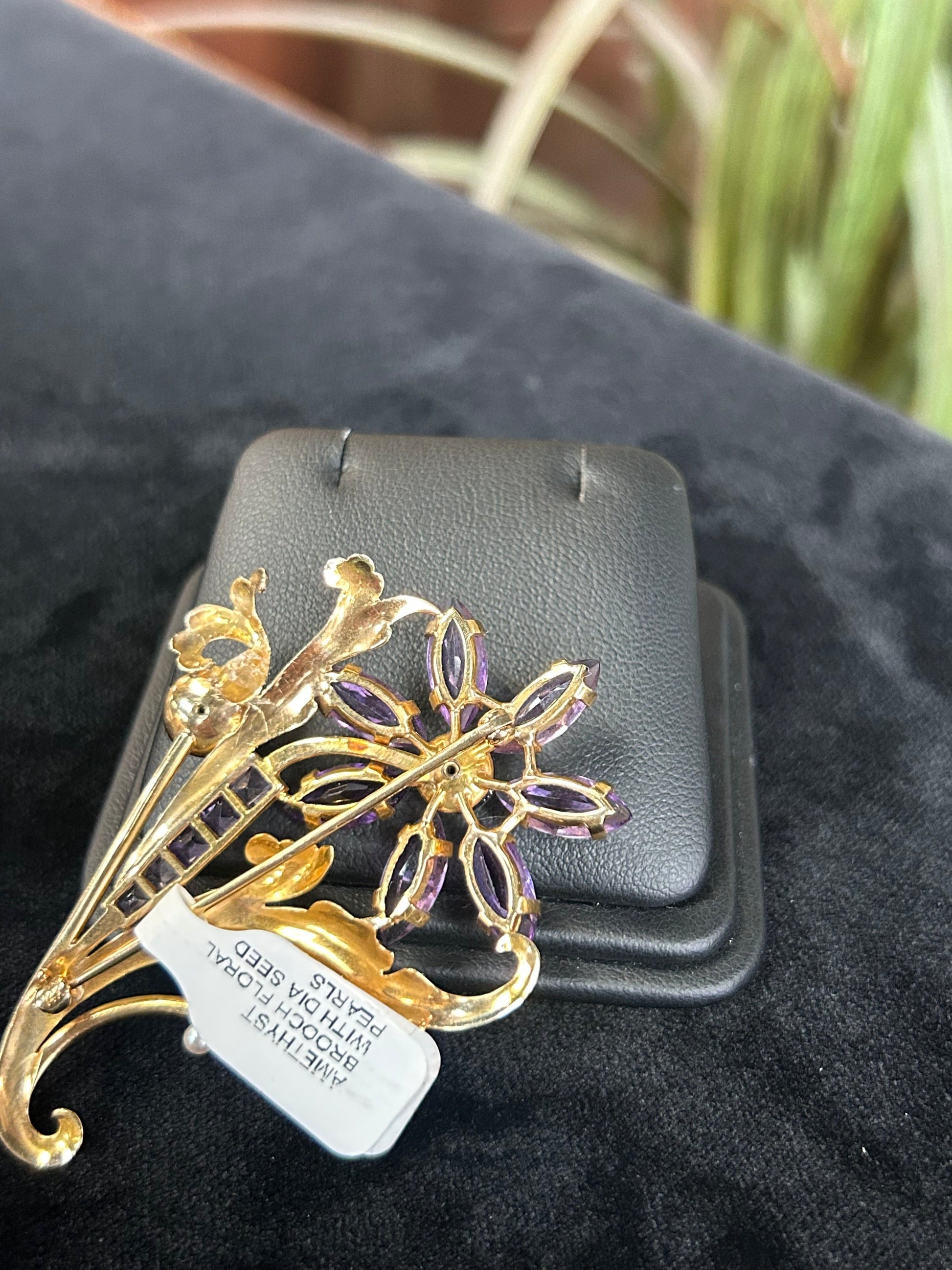 a close up of a cell phone with a flower on it