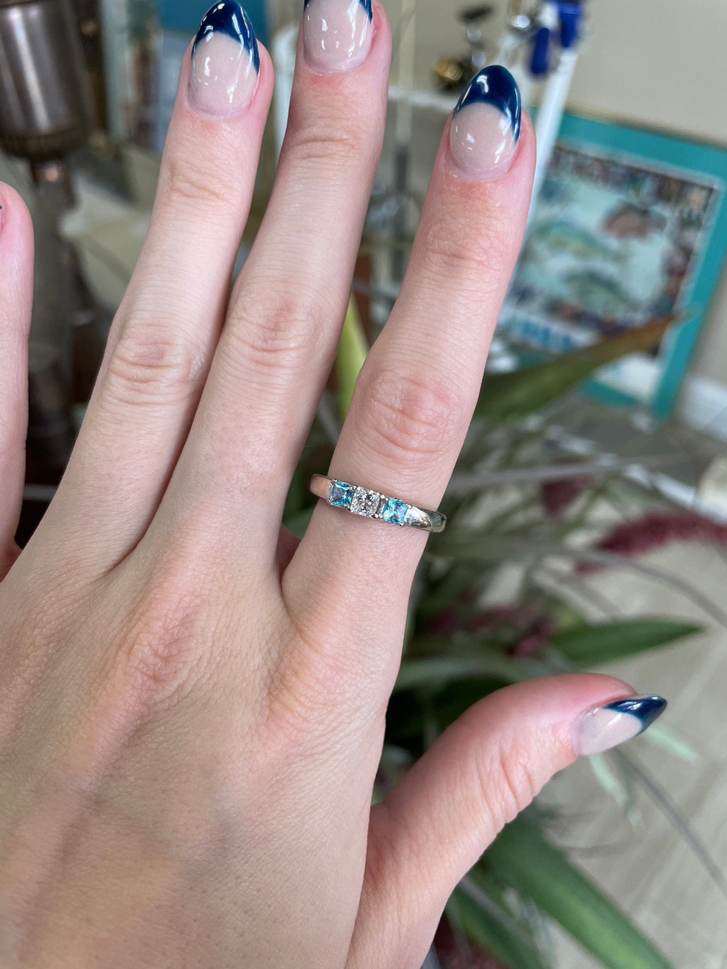 Blue topaz and diamond ring