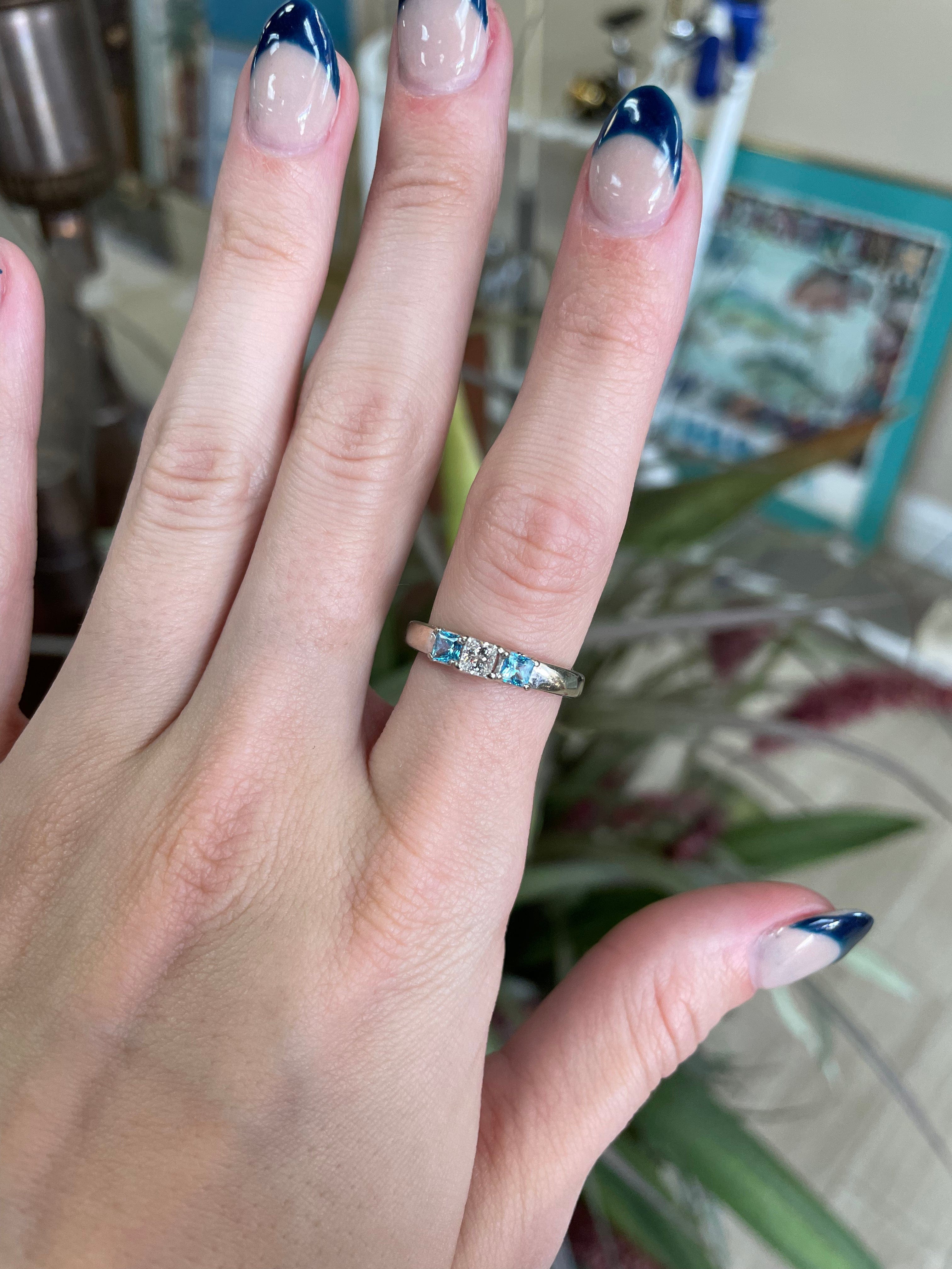 Blue topaz and diamond ring
