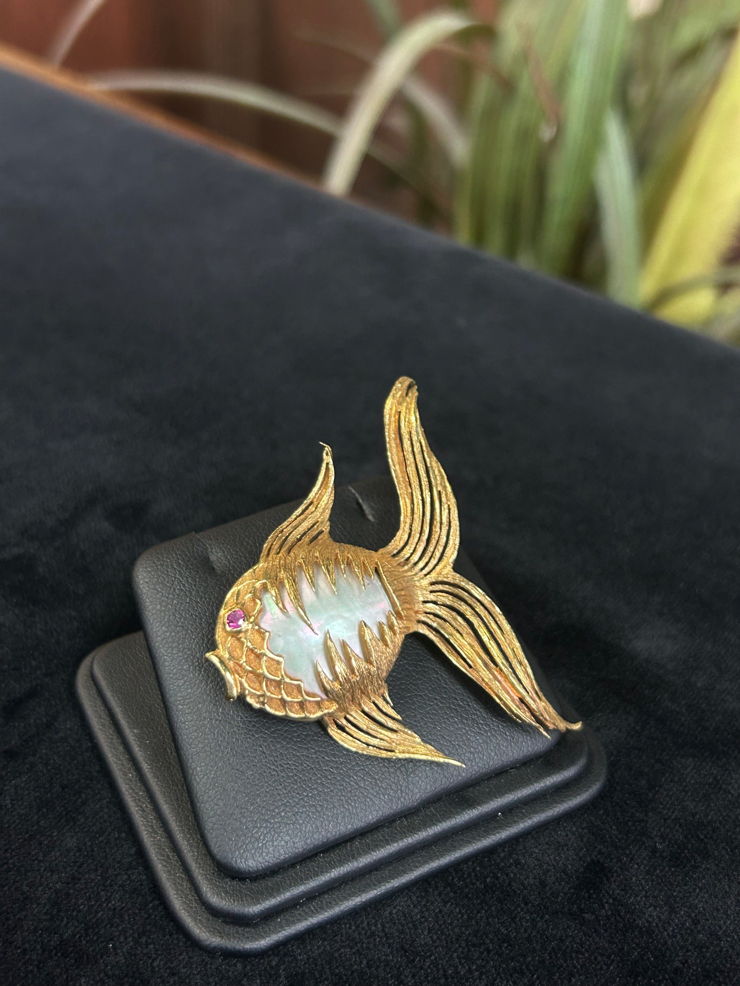 a close up of a ring with a bird on it